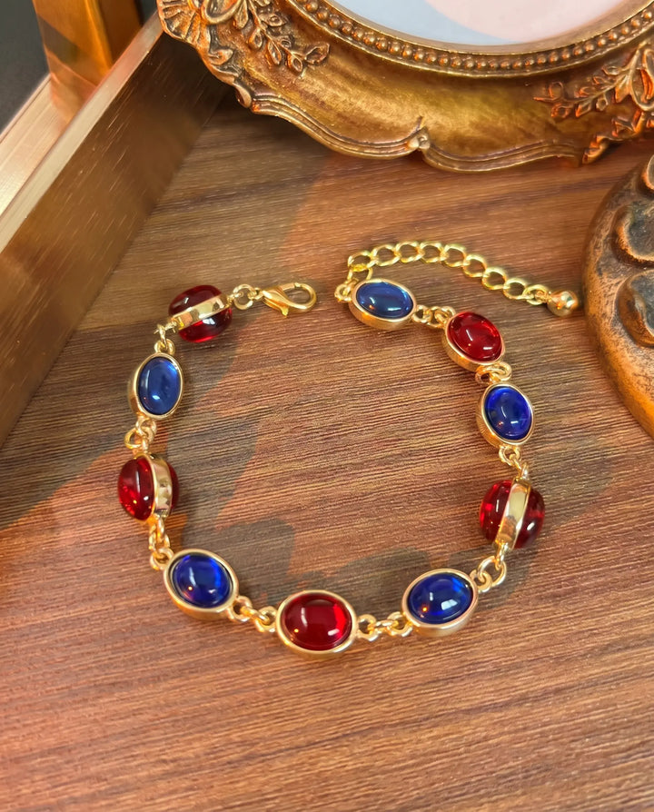 SOLACE  Gold Tone Alternating Red Blue Cabochon Alloy Bracelet 