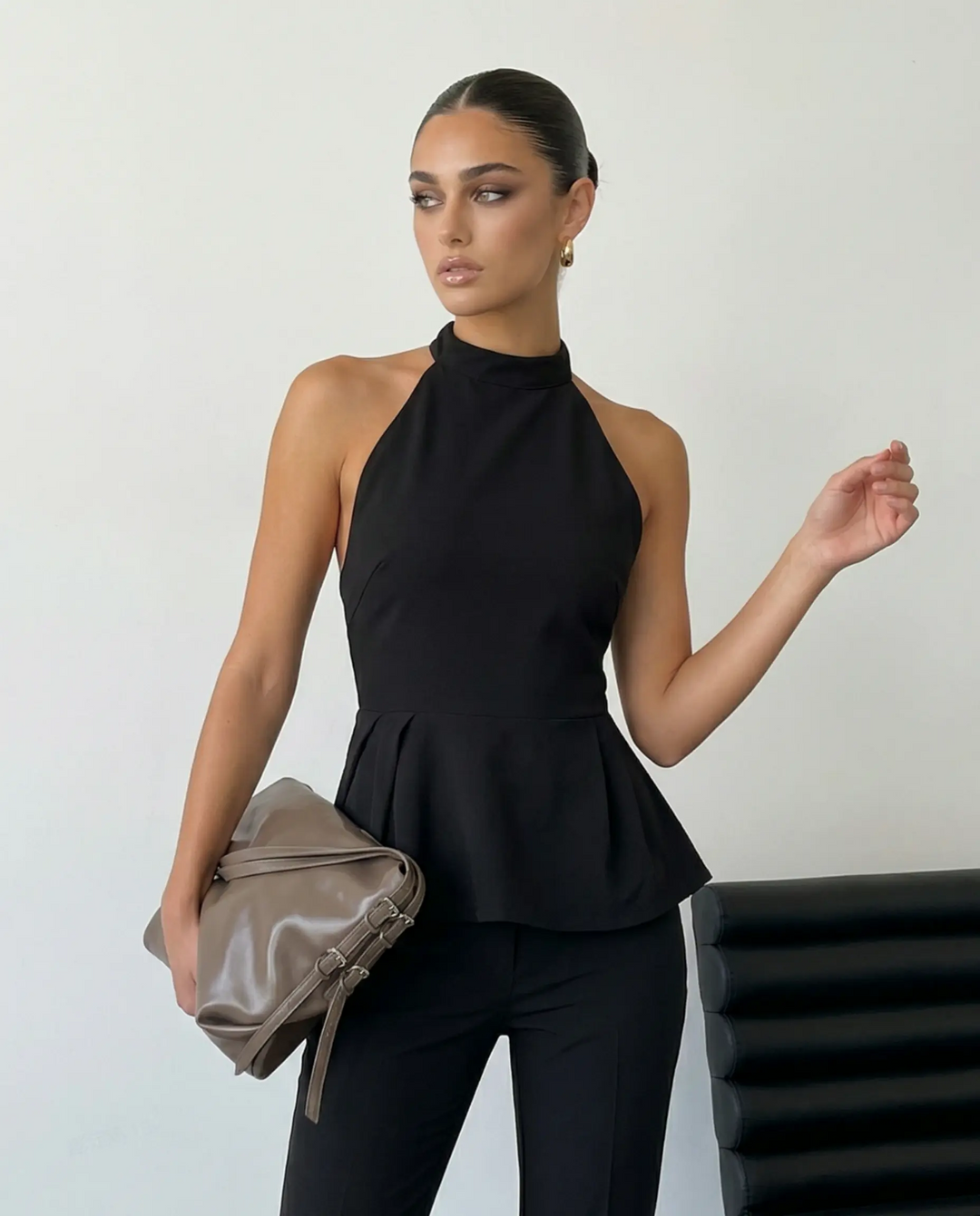 SOLACE  Black Solid Halter Neck Sleeveless Peplum Blouse 