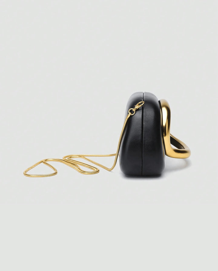 SOLACEBlack Faux Leather Curved Gold Metal Frame Snake Chain Crossbody Clutch Bag