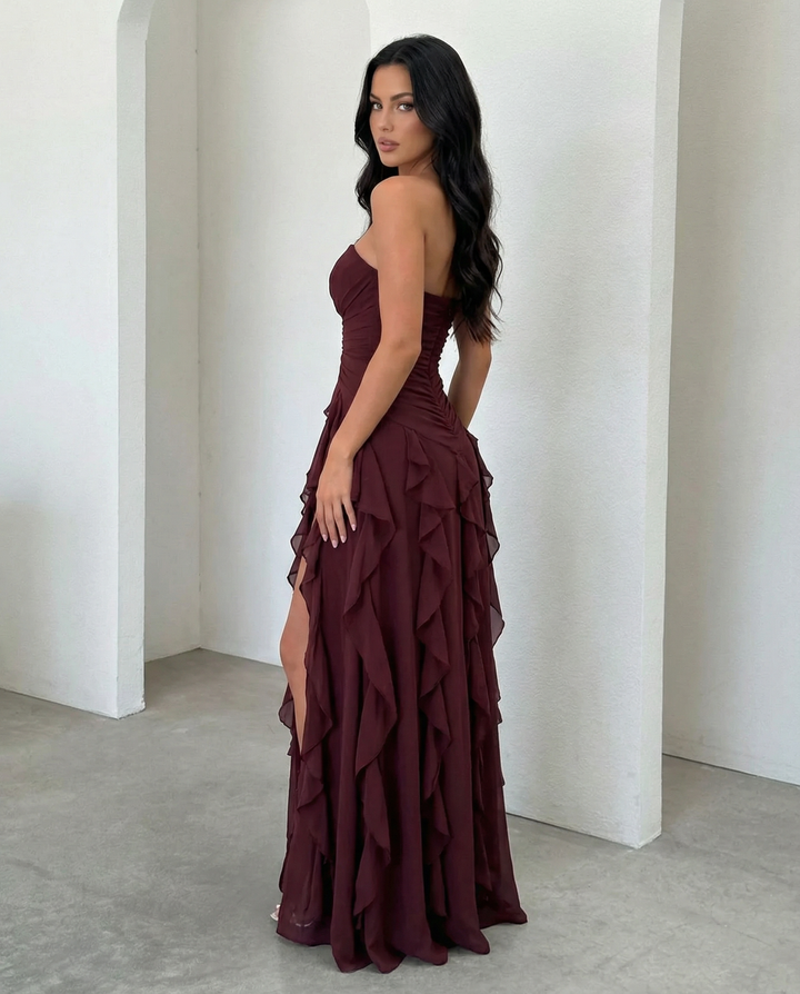 SOLACEBurgundy Strapless Ruched Waist Cascading Ruffle High Slit Chiffon Maxi Dress