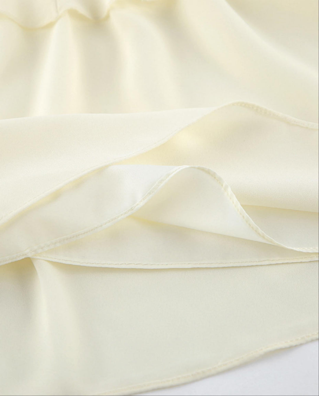 SOLACEElegant Beige Halter Neck Backless Ruffled Loose Top