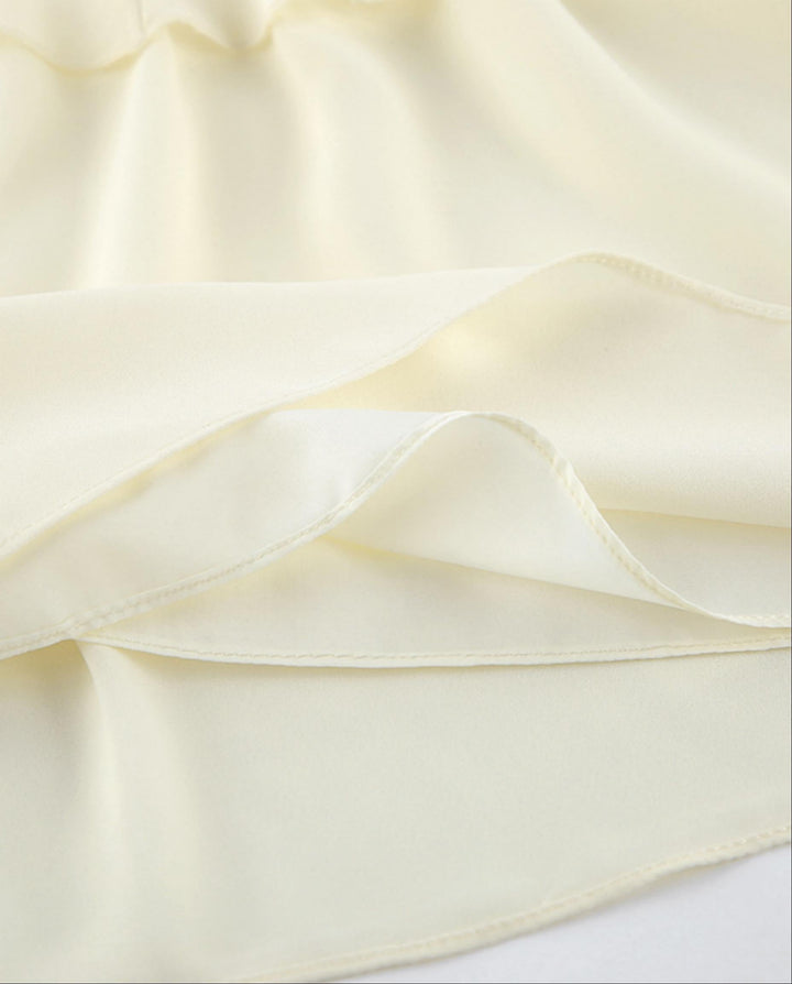 SOLACEElegant Beige Halter Neck Backless Ruffled Loose Top