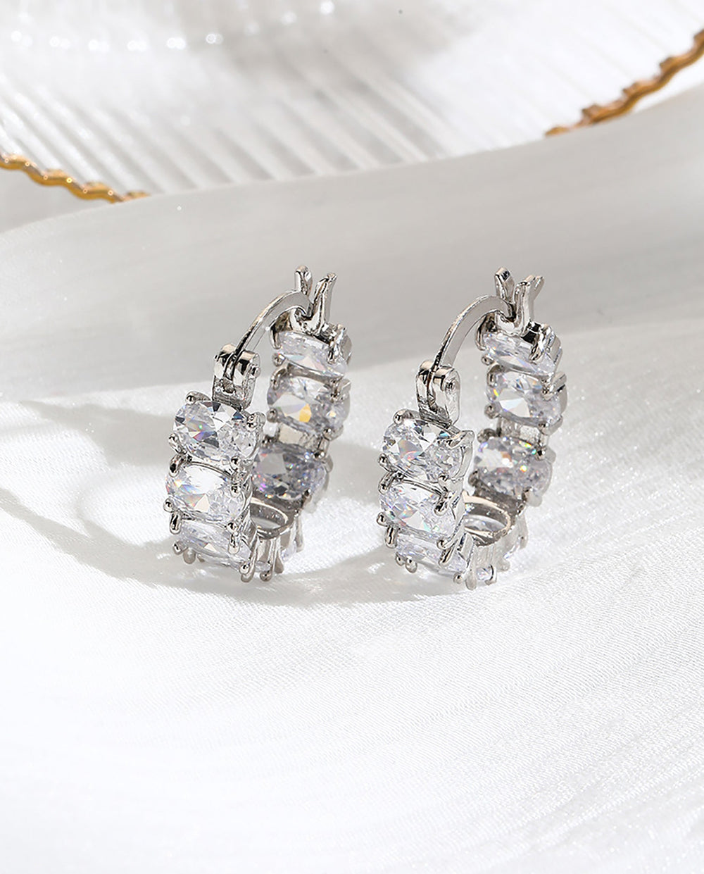 SOLACEOval Cubic Zirconia Full Paved Silver Huggie Hoop Earrings