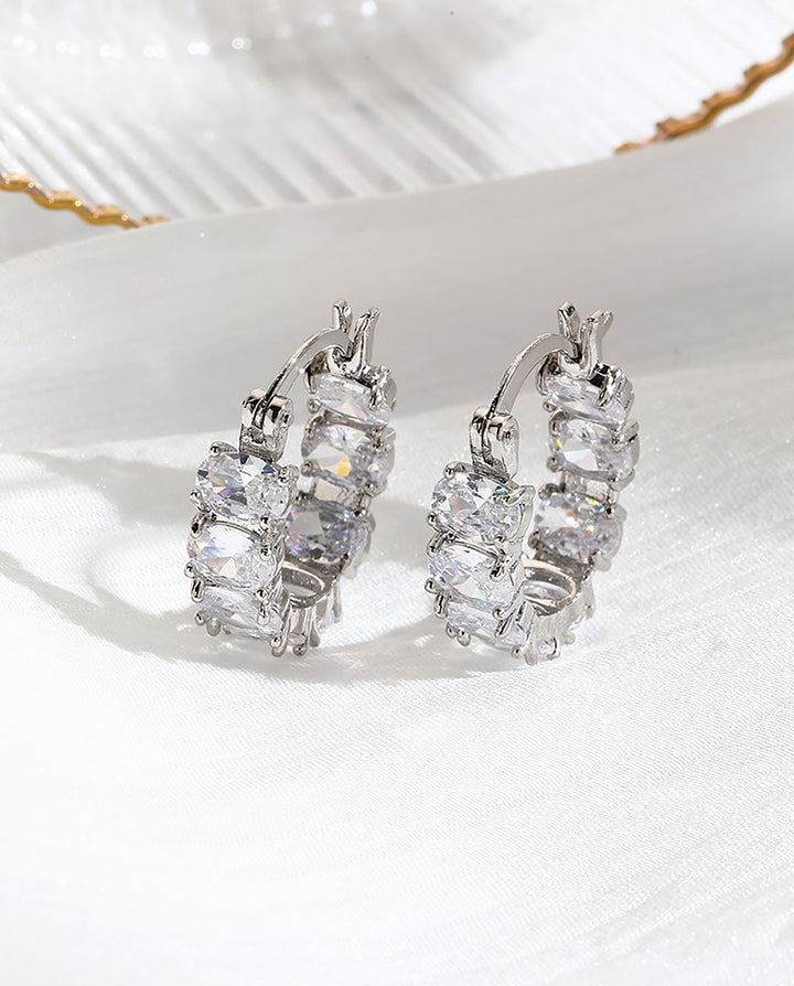 SOLACEOval Cubic Zirconia Full Paved Silver Huggie Hoop Earrings