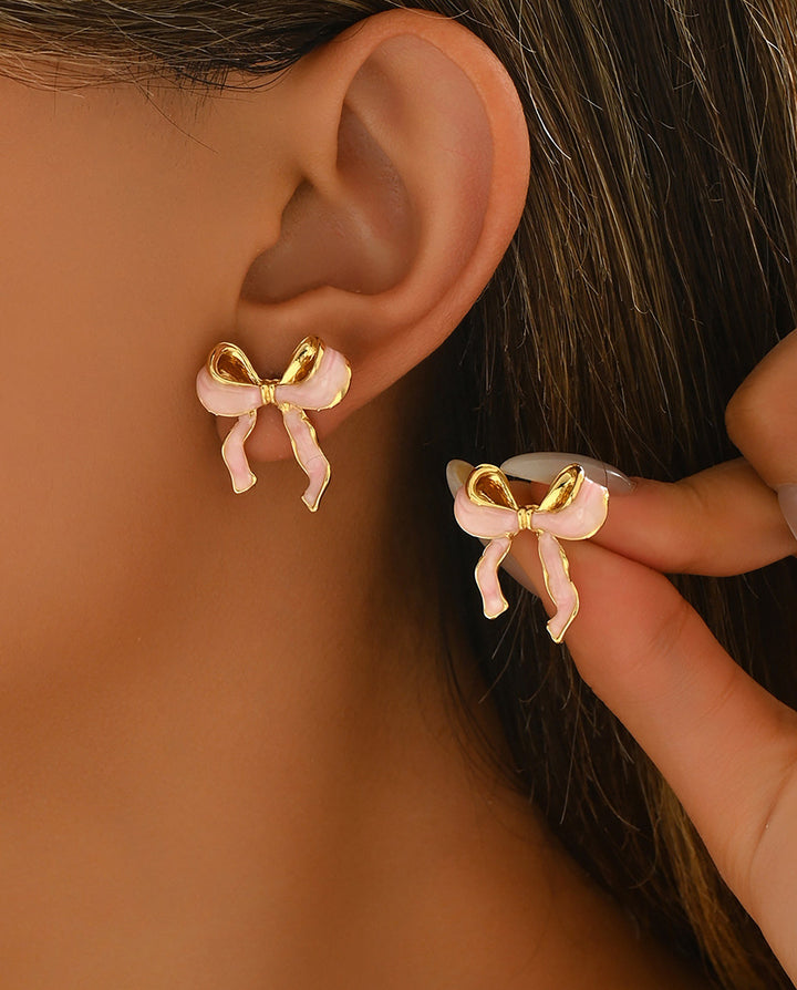 SOLACEPink Enamel Bow Stud Earrings with Gold Trim