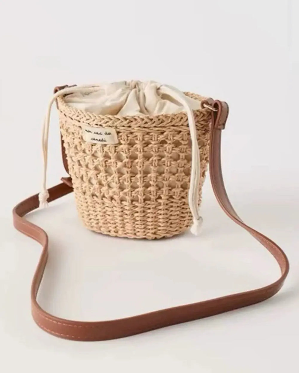 Hand-Woven Straw Drawstring Bucket Crossbody Bag SOLACE