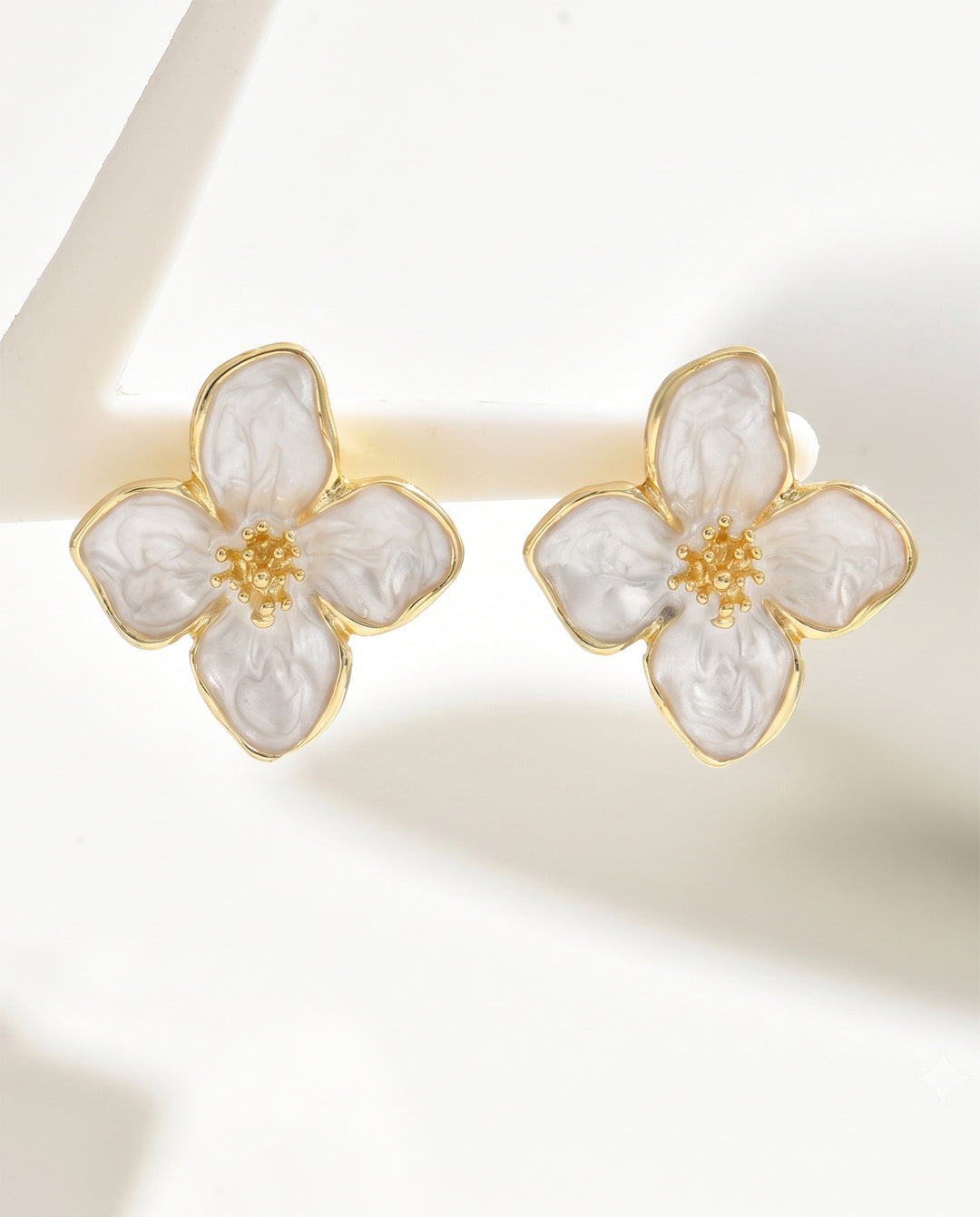 White Enamel Gold Trim Four Petal Flower Stud Earrings