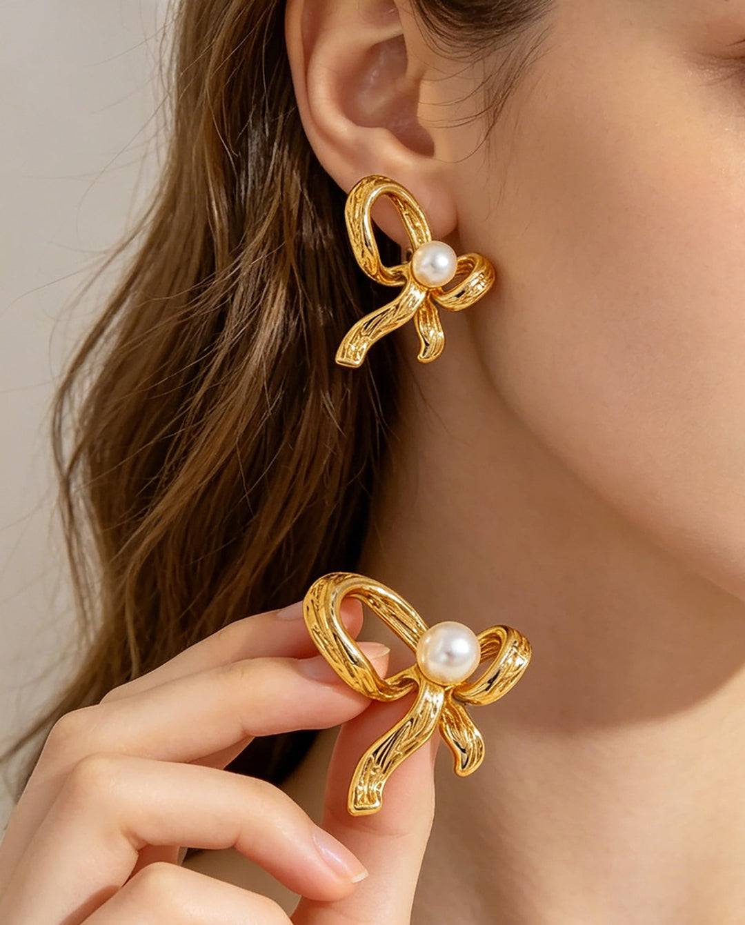 SOLACETextured Gold Bow White Faux Pearl Stud Earrings