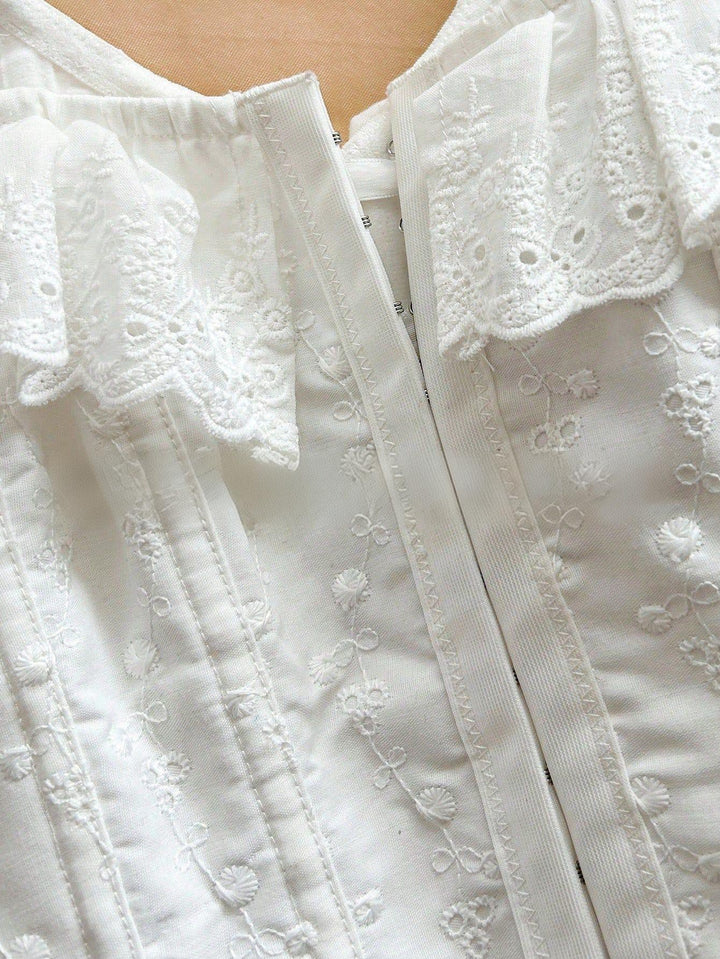 SOLACEWhite Eyelet Embroidered Ruffle Strap Corset Top
