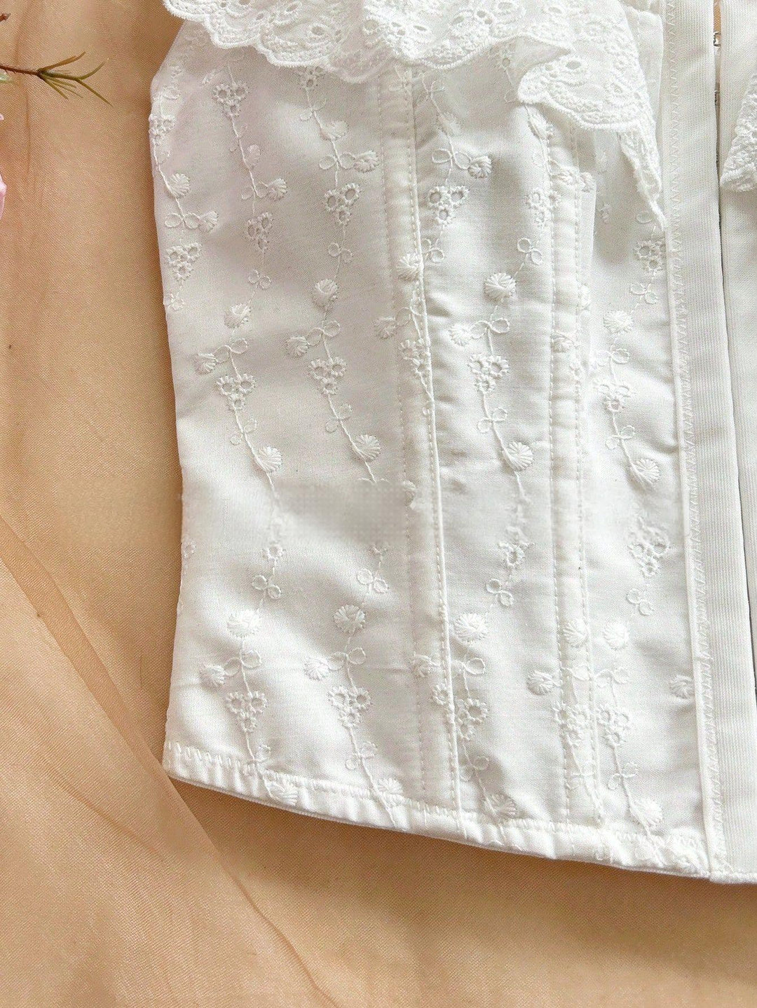 SOLACEWhite Eyelet Embroidered Ruffle Strap Corset Top